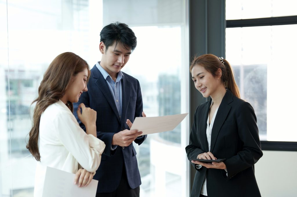 Business asian people having a business meeting. Happy diverse business team young and old workers