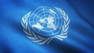 Closeup shot of the waving flag of the United Nations with interesting textures