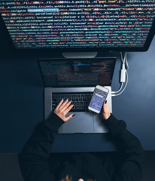 Cyber security threat. Young woman using computer and coding. Internet and network security