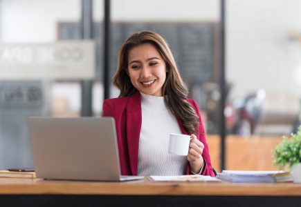 attractive-young-asian-woman-using-laptop-computer-2023-01-31-23-40-38-utc-scaled.jpg